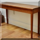F17. Handcrafted maple console table. 29”h x 52”w x 15.5”d 